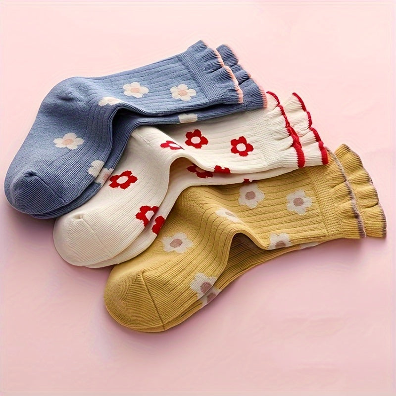 5 children's crew socks with breathable, soft fabric and stylish floral design, ideal for spring and summer.