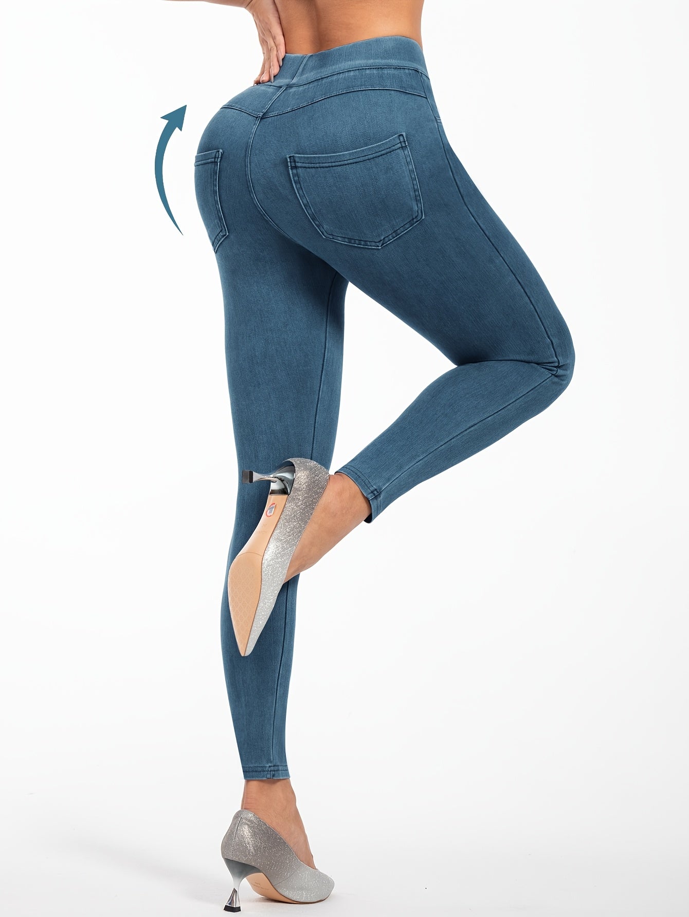 Women's high-waist faux denim jegging with elastic band and pockets. Polyester spandex blend for medium support. Solid color, woven fabric, cropped length. Suitable for everyday wear.