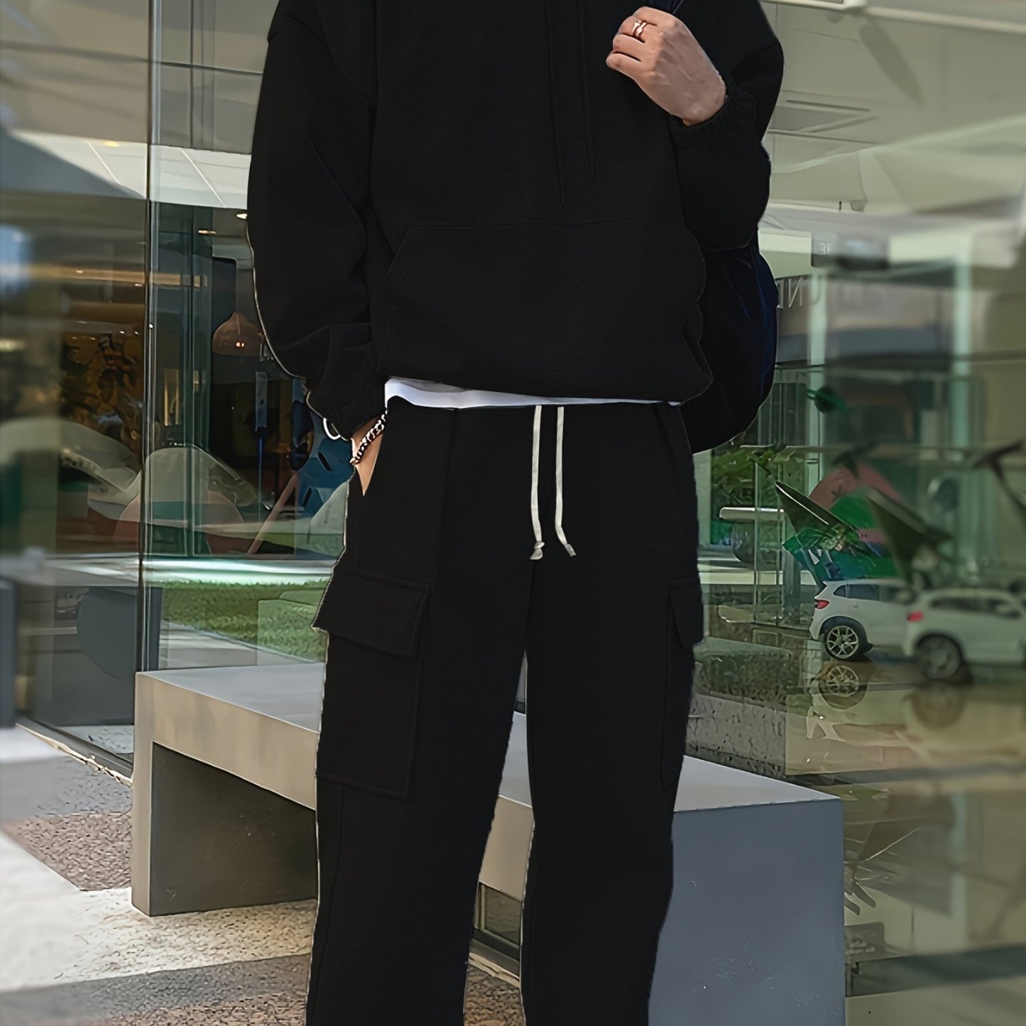 Men's Casual Hooded Sweatshirt and Pants Set made of 100% polyester with a slight stretch knit fabric. Regular fit in solid color perfect for outdoor sports and daily wear. Part of the