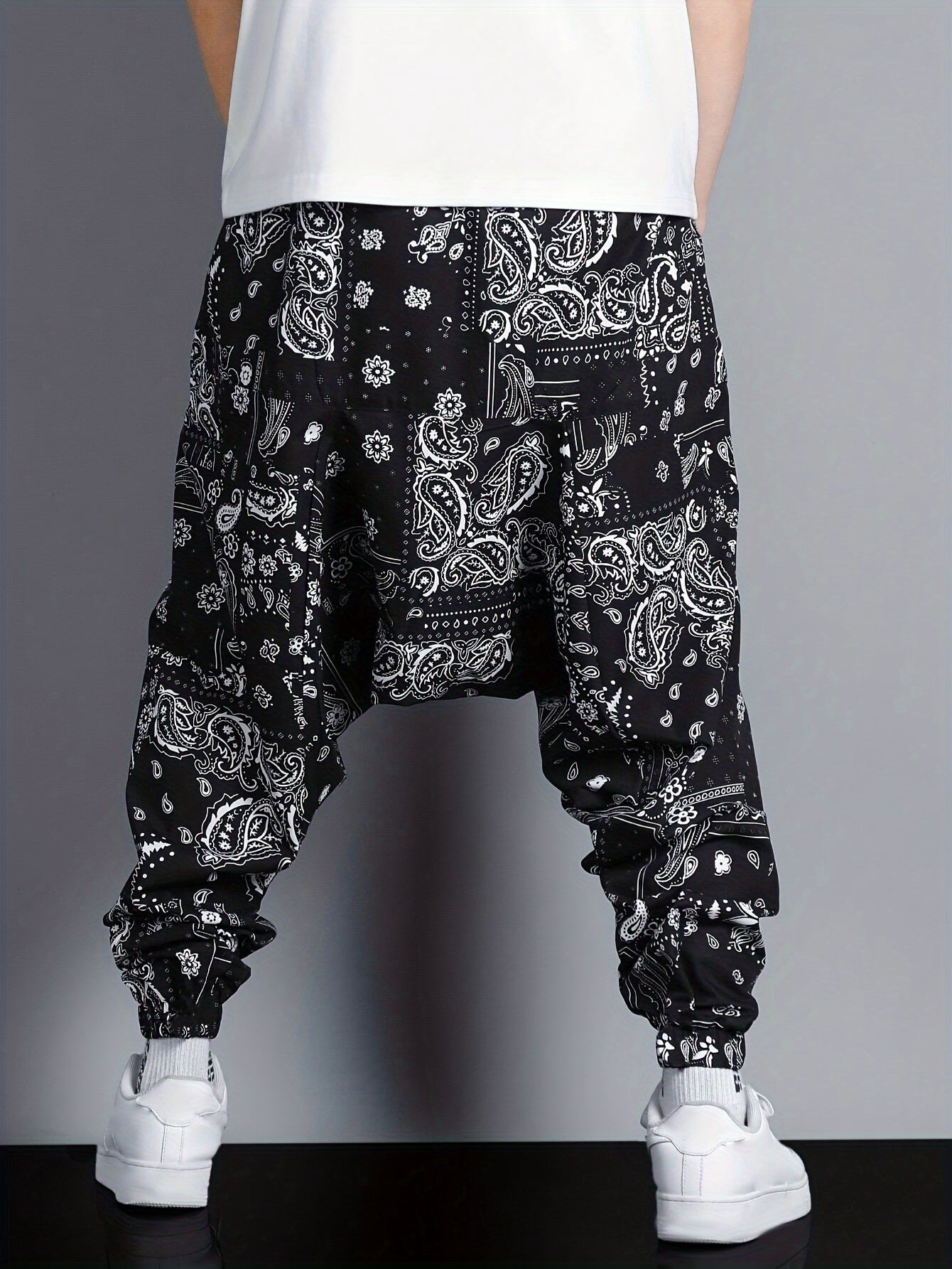 Men's oversized joggers featuring paisley pattern print.