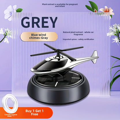 Car perfume diffuser with solar-powered aromatherapy helicopter decoration and air freshener. Ideal car accessory gift.