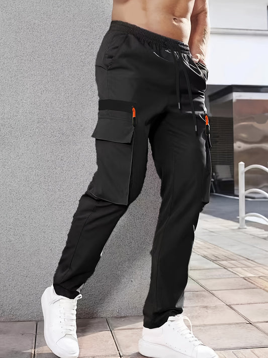 Men's casual cargo pants made of solid color polyester, feature a regular fit, multiple pockets, and straight-leg design for sports and leisure activities all year round.