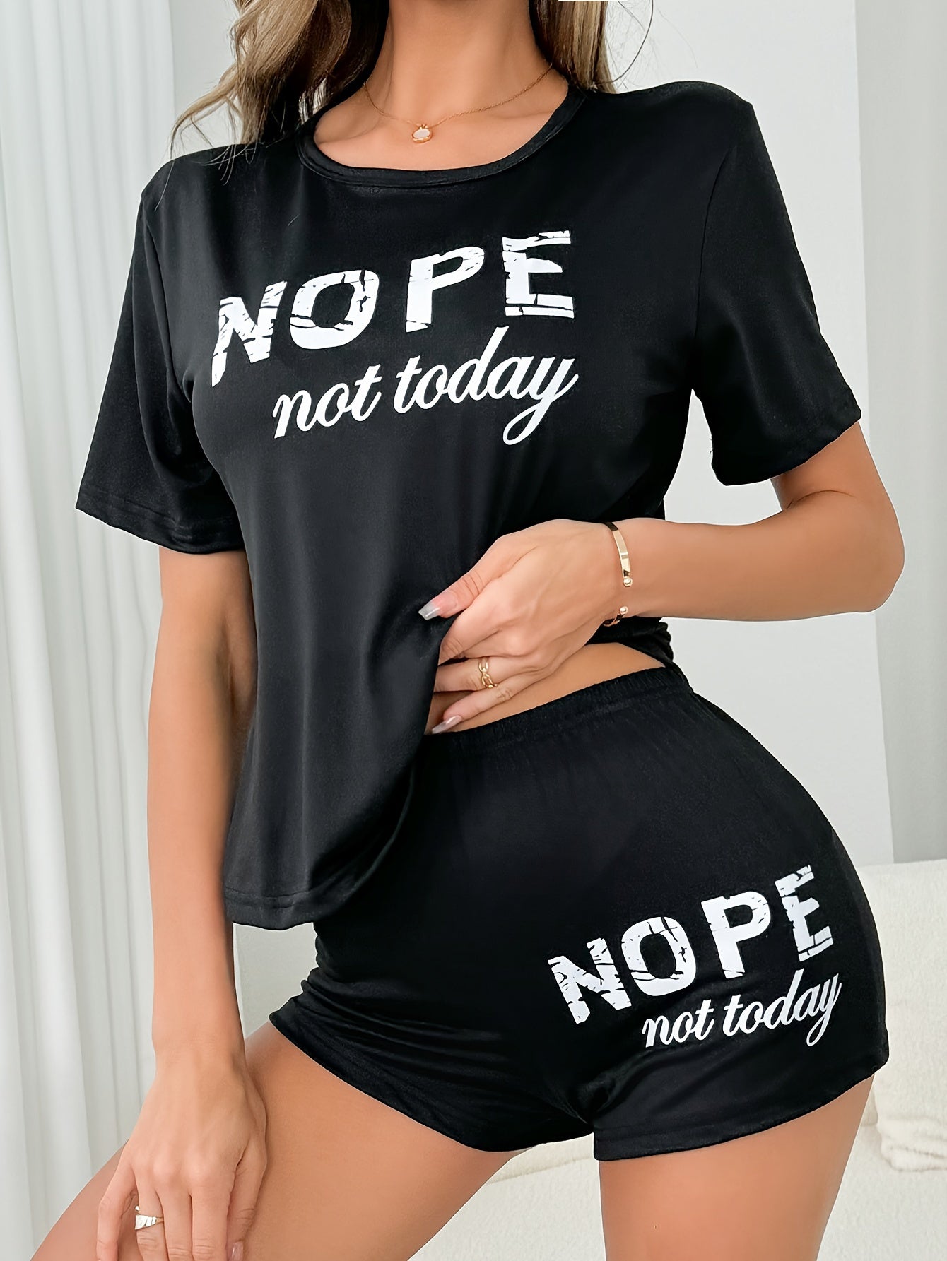 Women's casual pajama set with "NOPE not today" print, including short sleeve t-shirt and shorts. Comfortable loungewear for sleeping or lounging.