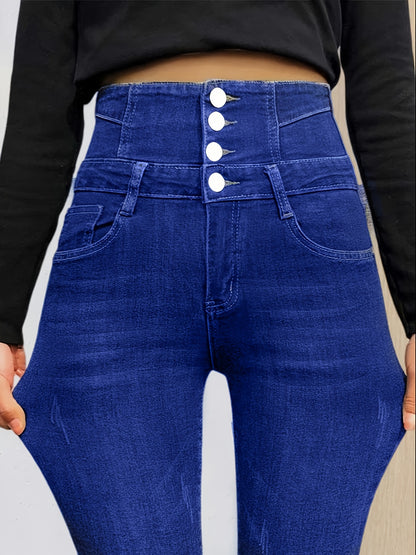 High-waisted skinny jeans with button detail for plus size women, in blue denim.