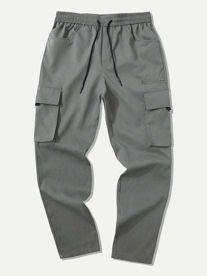 Men's cargo pants with multiple pockets and drawstring for outdoor activities.