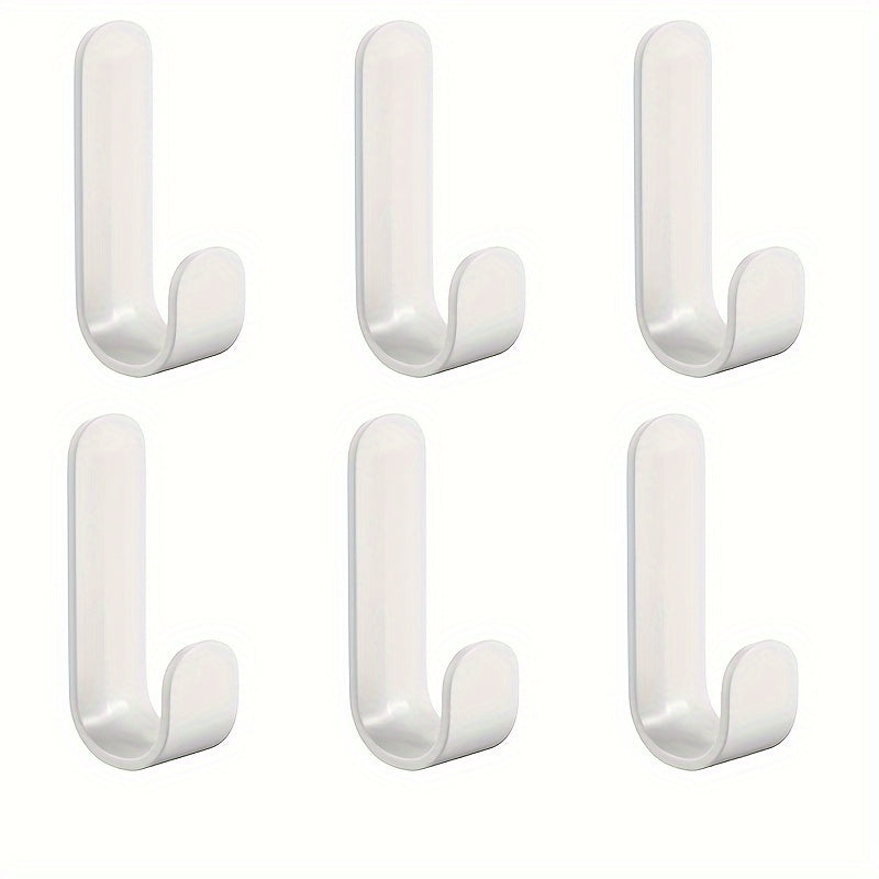 6 J-shaped hooks for hanging clothes on doors or walls without damaging them.