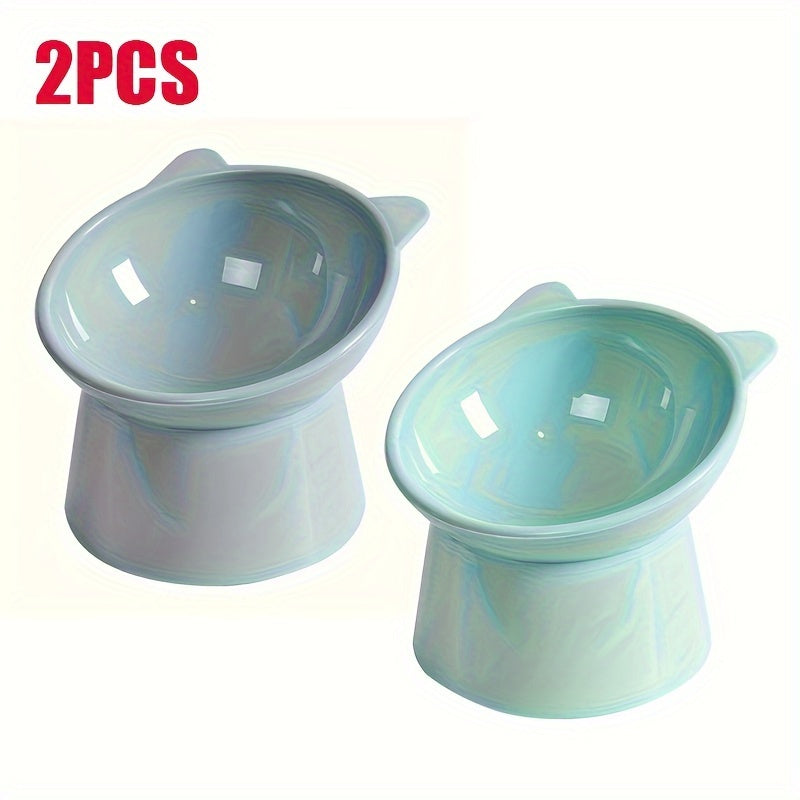 Two elevated cat bowls with tilted design made of durable plastic for easy cleaning, whisker-friendly, neck strain reducing, and digestion enhancing.