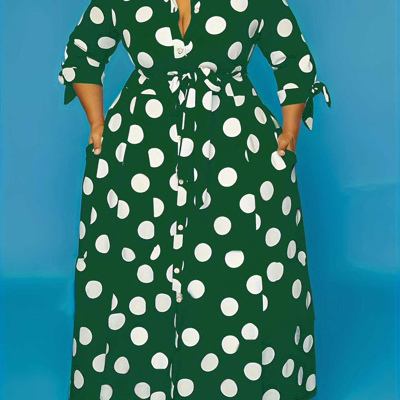 Women's plus size polka dot print maxi dress with collared button-up front and belted waist.