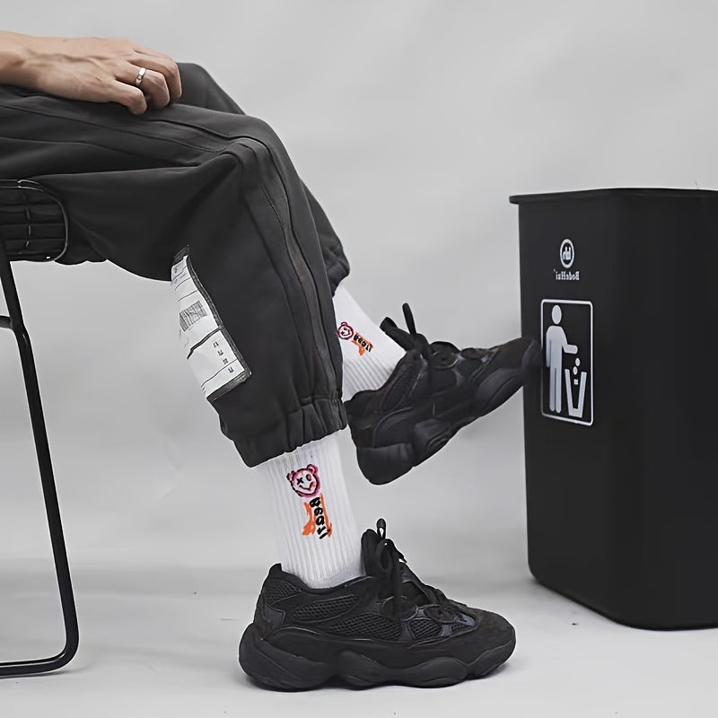 10 Pairs Men's Mid-Calf Socks - Stylish graffiti design, perfect for daily wear and outdoor activities. Made of a blend of polyester and spandex.