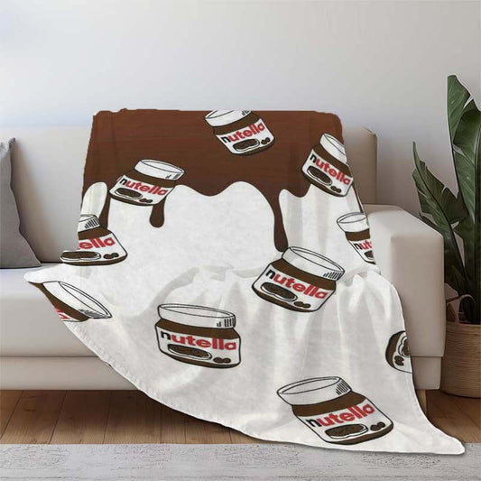 Stay warm and cozy with our Nutella Print Flannel Fleece Blanket! This blanket features a mixed color design and is made of polyester with a digital print. Perfect for all seasons, this charming anime-themed blanket is ideal for use in the home, kitchen