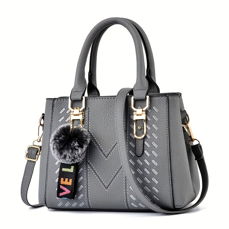 Mother's Day gift bag features women's trendy handbag with ball pendant, simple quilted shoulder crossbody style, perfect for mom and family.