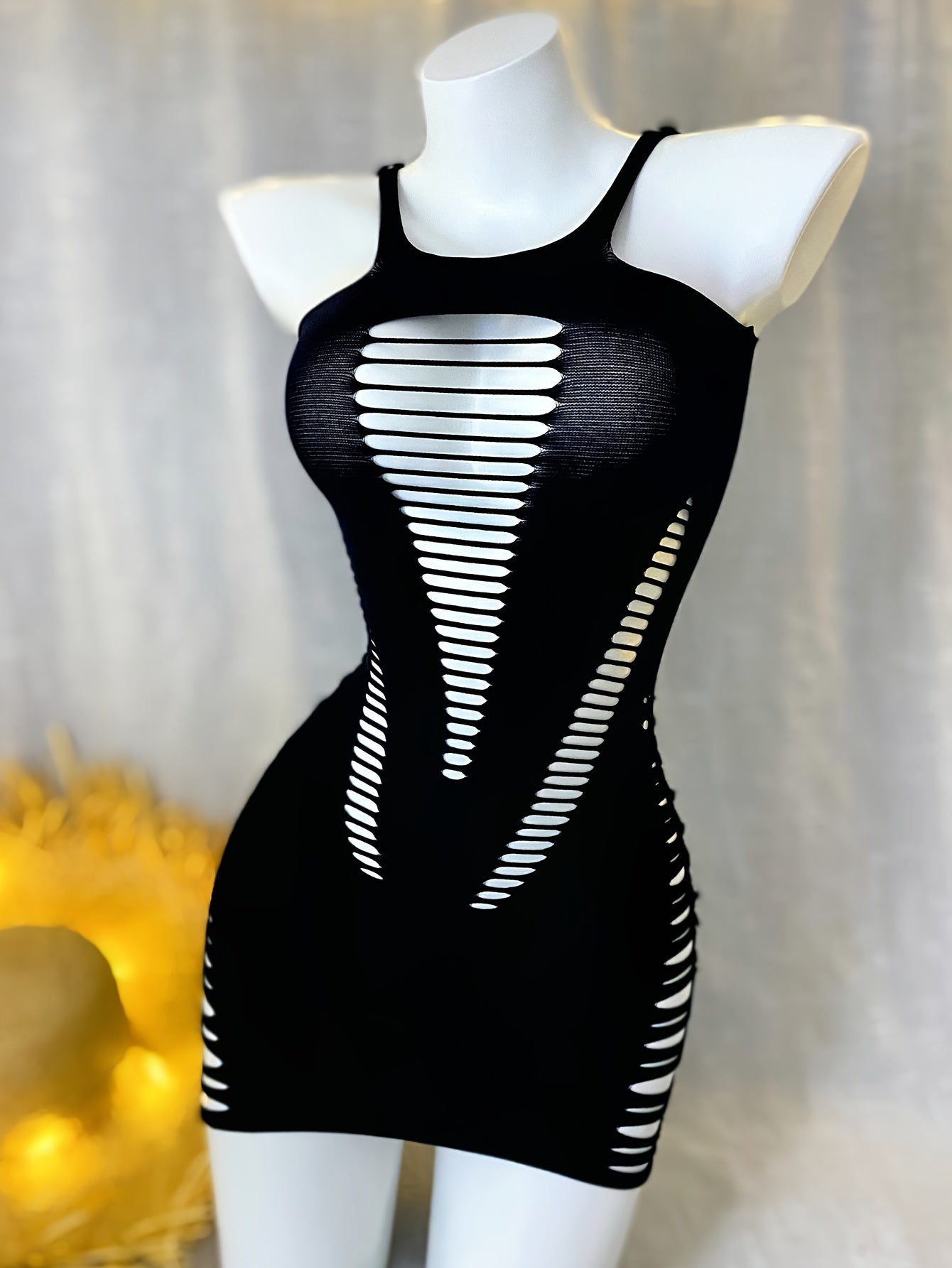 Sexy Gu sleeveless bodycon dress, ideal for music festivals or vacations. High stretch knit fabric with hollow out design and solid color polyamide cover up. Perfect beachwear swimsuit for