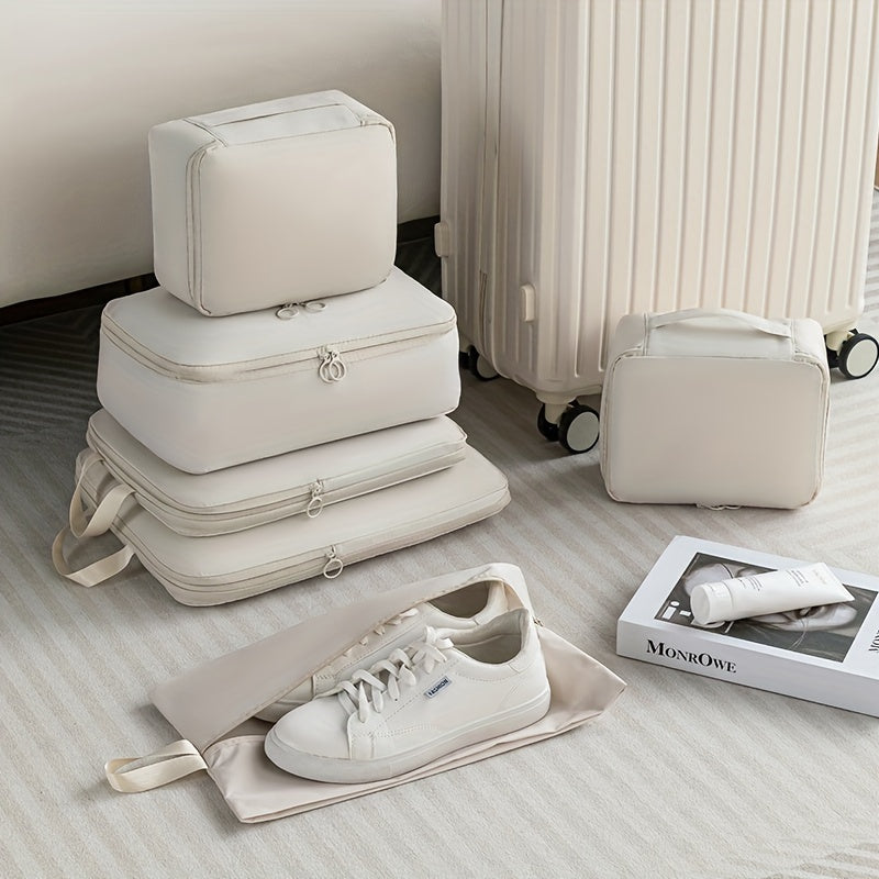 Durable 6-piece packing cubes set made of polyester for organizing clothes, toiletries, and luggage while traveling.