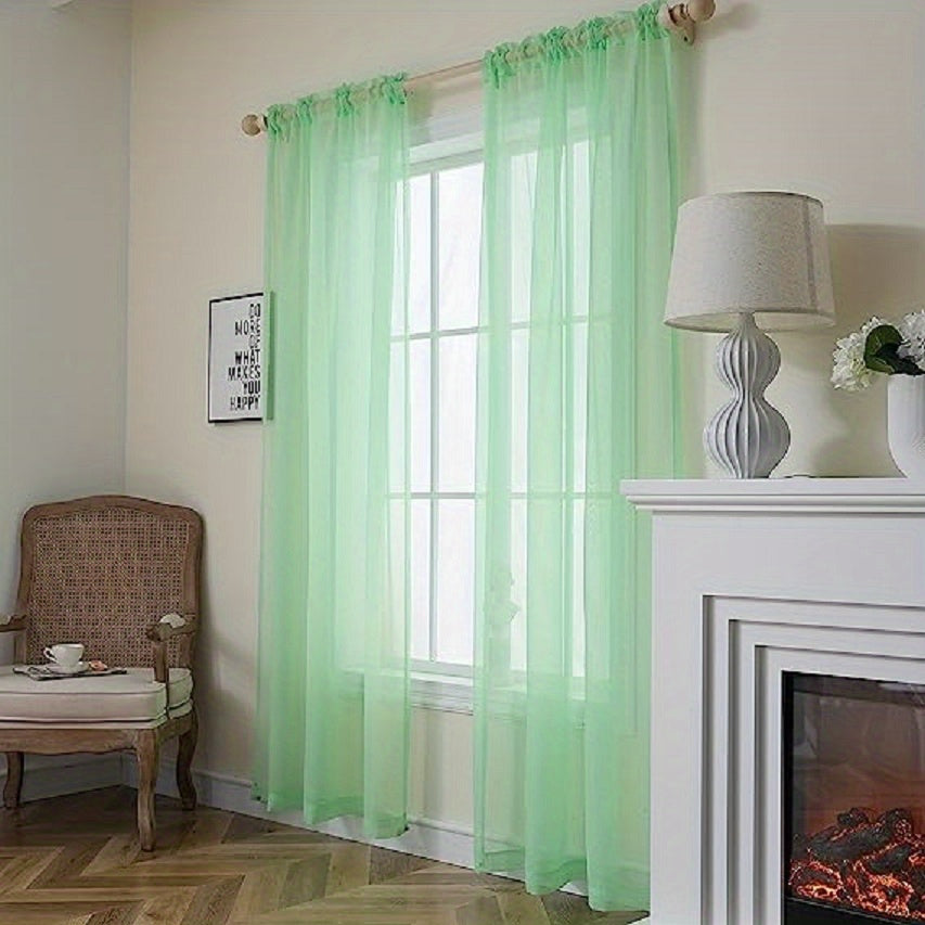 Two panels of sheer curtains with a basic rod pocket design, perfect for adding a touch of elegance to your bedroom, office, living room, yard, kitchen, or any other space in your home.