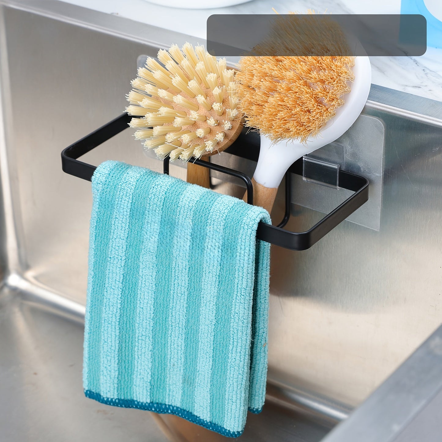 A versatile, durable cleaning tool storage rack made of plastic, featuring sponge racks. This space-saving rack is easy to install and suitable for kitchens, bathrooms, and general household storage needs. It is multifunctional and designed to store