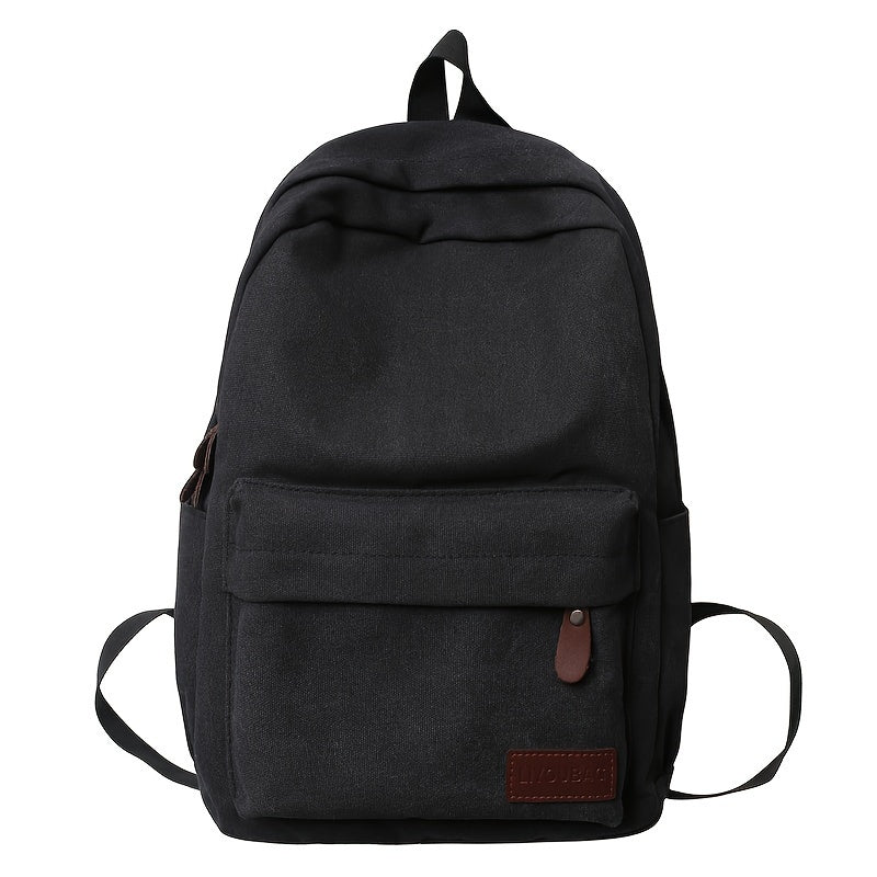 Sturdy canvas backpack with adjustable straps, perfect for school, travel, and work, fits 15-inch laptop.