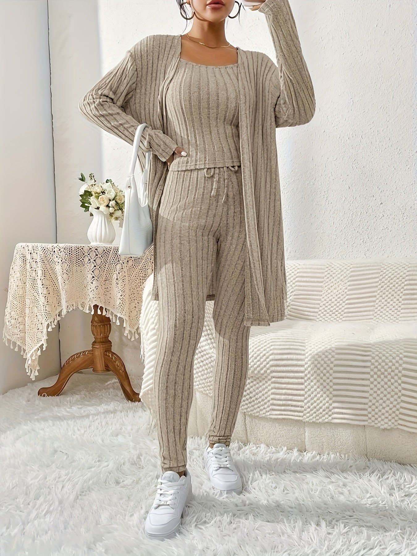 Fall and winter casual loungewear set for women, including a cardigan, camisole, and pants.