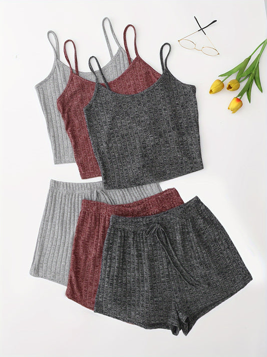 Women's 3-piece pajama set with solid cami top, lace-up shorts, and round neck, perfect for sleepwear and loungewear.