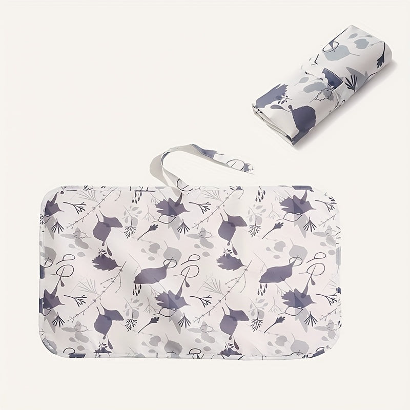 Lightweight and waterproof, this foldable diaper changing pad is perfect for traveling with your little one. Stay prepared for on-the-go diaper changes with this portable and compact changing mat.