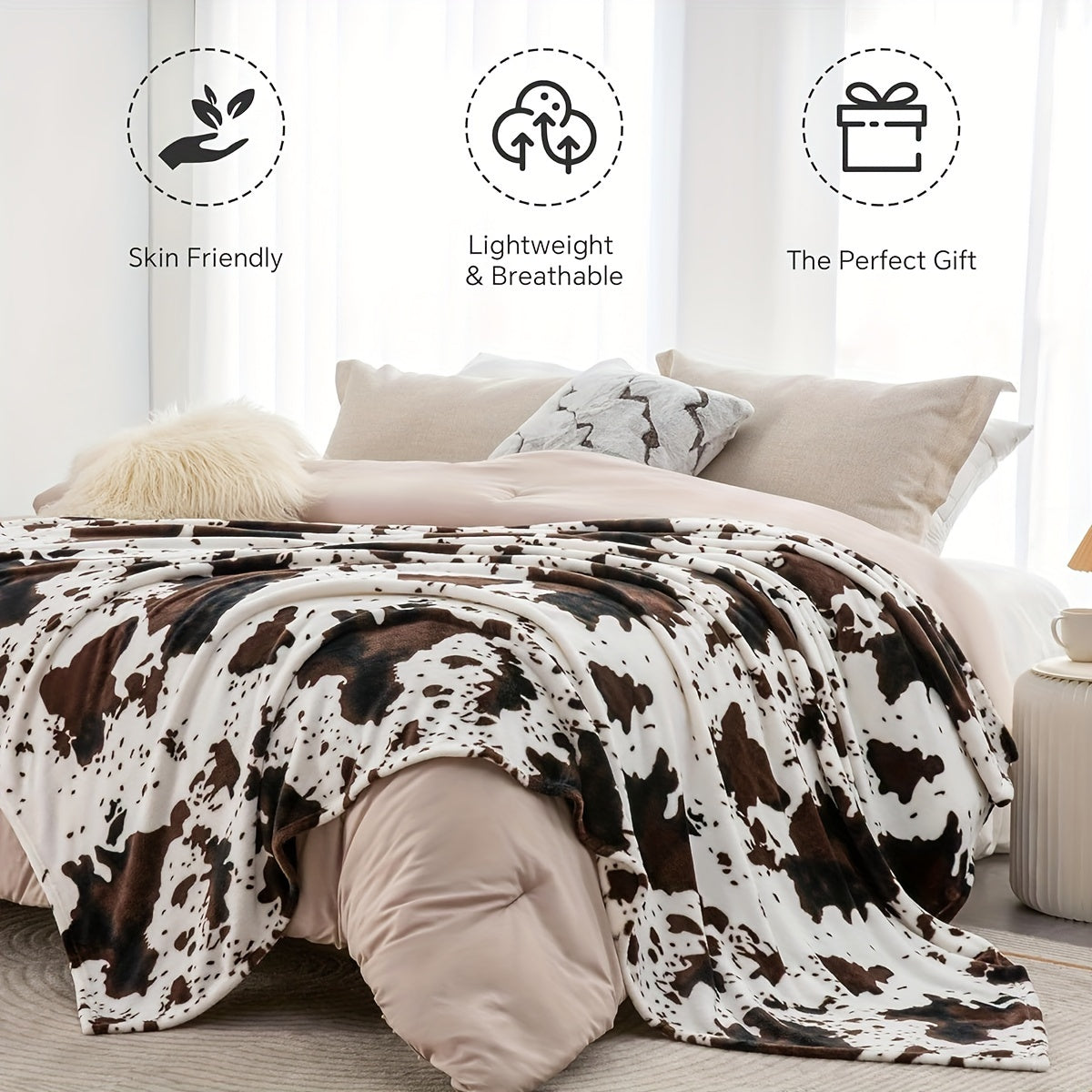 Get cozy with this soft and warm cow print blanket. Perfect for adding a touch of whimsy to your sofa, couch, or bed, this lightweight throw is made from plush flannel fleece. It's a great gift idea for any cow lover and perfect for all seasons.