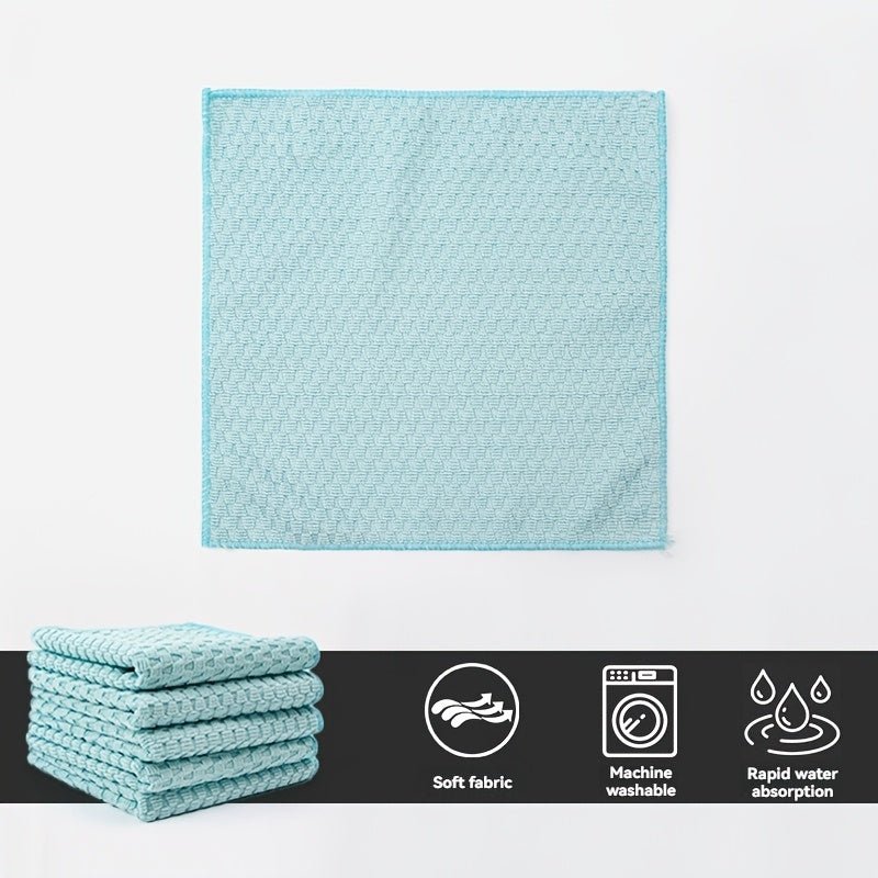 Two pieces of highly absorbent microfiber cleaning cloths with a thick and textured design, perfect for dishwashing and wiping surfaces. Featuring a colorful and space-themed pattern, these kitchen towels are ideal for use at home.