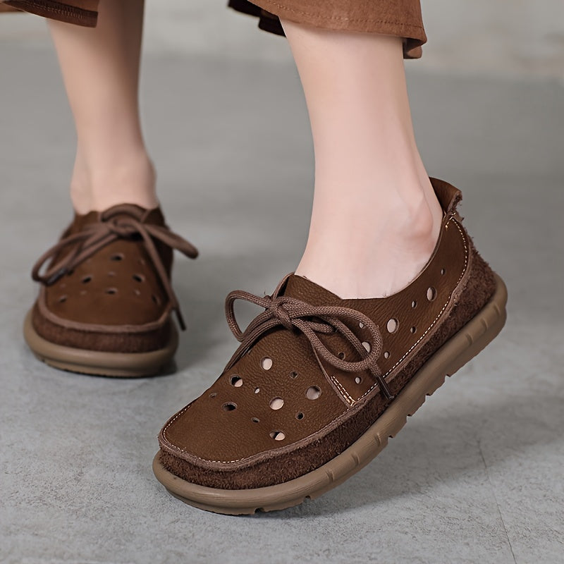 Genuine leather loafers with perforated design and lace-up closure, featuring a soft rubber sole for comfort. Brown leather shoes ideal for summer, offering breathability and style. Stylish