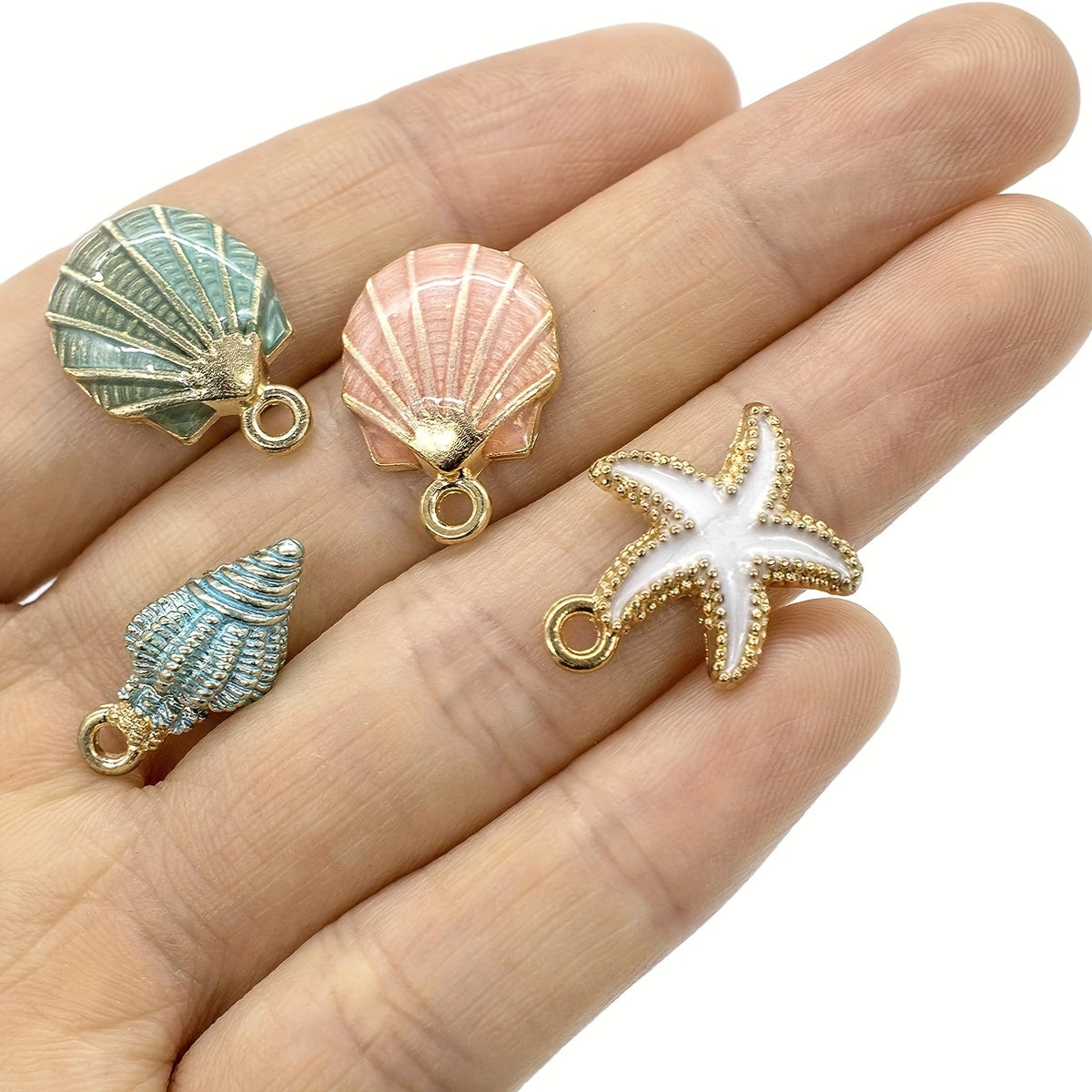 Set of 30 Ocean Series Charms featuring Starfish, Conch, and Seashell designs - perfect for creating DIY jewelry with alloy enamel pendants.