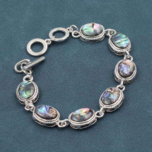 Vintage-style oval abalone shell link charm bracelet - a colorful and unique women's jewelry gift.