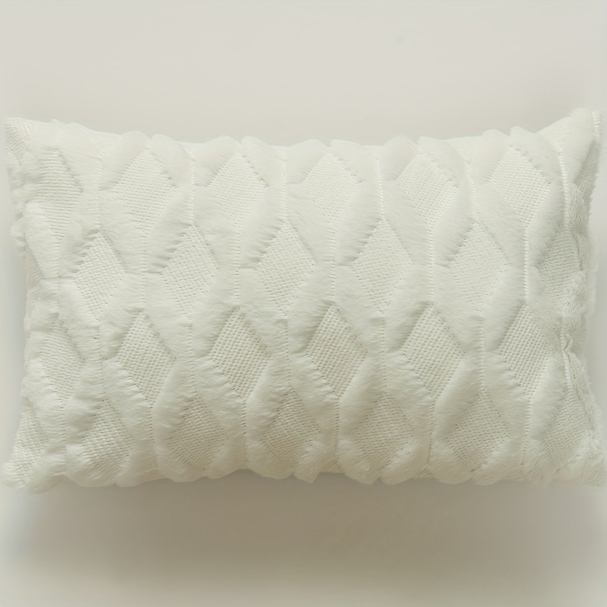 Indulge in the luxurious comfort of our Ultra-Soft Plush Diamond Quilted Throw Pillow Cover. Featuring a solid color back and a zip closure for easy removal, this cozy and comfortable cover is the perfect addition to your living room, bedroom, or sofa