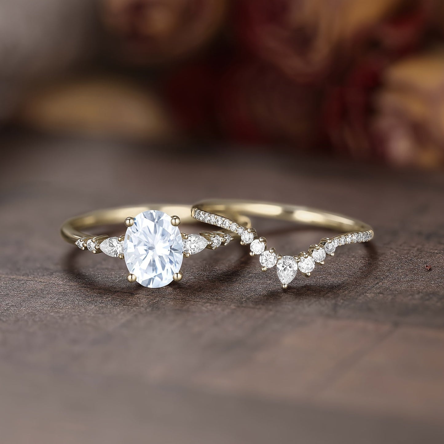 Two elegant and luxurious egg-shaped engagement rings for women, featuring an oval-shaped cubic zirconia center stone adorned with teardrop cubic zirconia. These exquisite and unique egg-shaped cubic zirconia women's wedding rings are perfect for