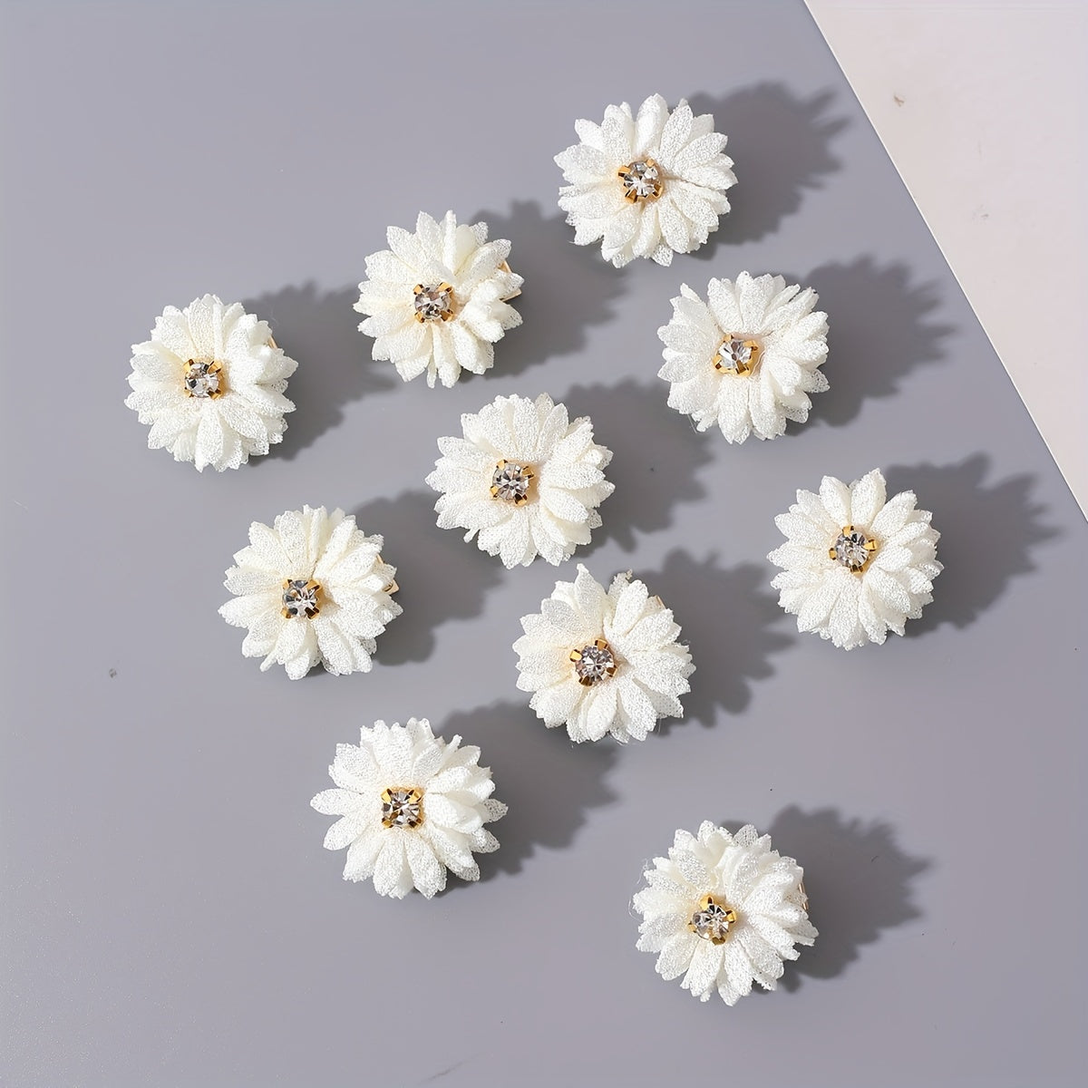 A set of 10 Chinese-style hair clips with fabric flowers and rhinestone centers in white, perfect for parties and daily wear.