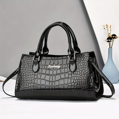 Fashionable black crocodile-embossed women's handbag with adjustable strap, zip closure, and wrist strap. Lightweight and versatile for everyday use, can be worn as a crossbody or shoulder