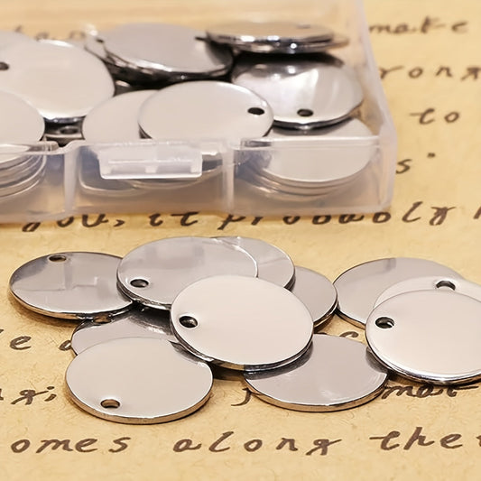 Fifty pieces of 25mm round stainless steel pendants, flat blank stamping tag pendants. These mini discs are perfect for creating bracelet, earring, and necklace chain charms. Great for jewelry making, featuring number and alphabet stamping designs.