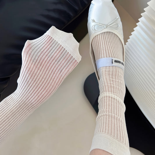 4 pairs of comfy mid-tube socks for women, with hollow out design for breathability.