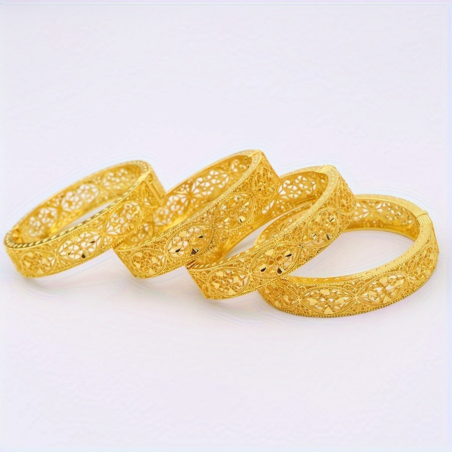 A pack of 4 Dubai bracelets in popular Middle Eastern style, plated with 24k gold. These fashion-forward and versatile bracelets are perfect for weddings or everyday wear. The set includes a classic hollow ring surrounded by love-themed designs, creating