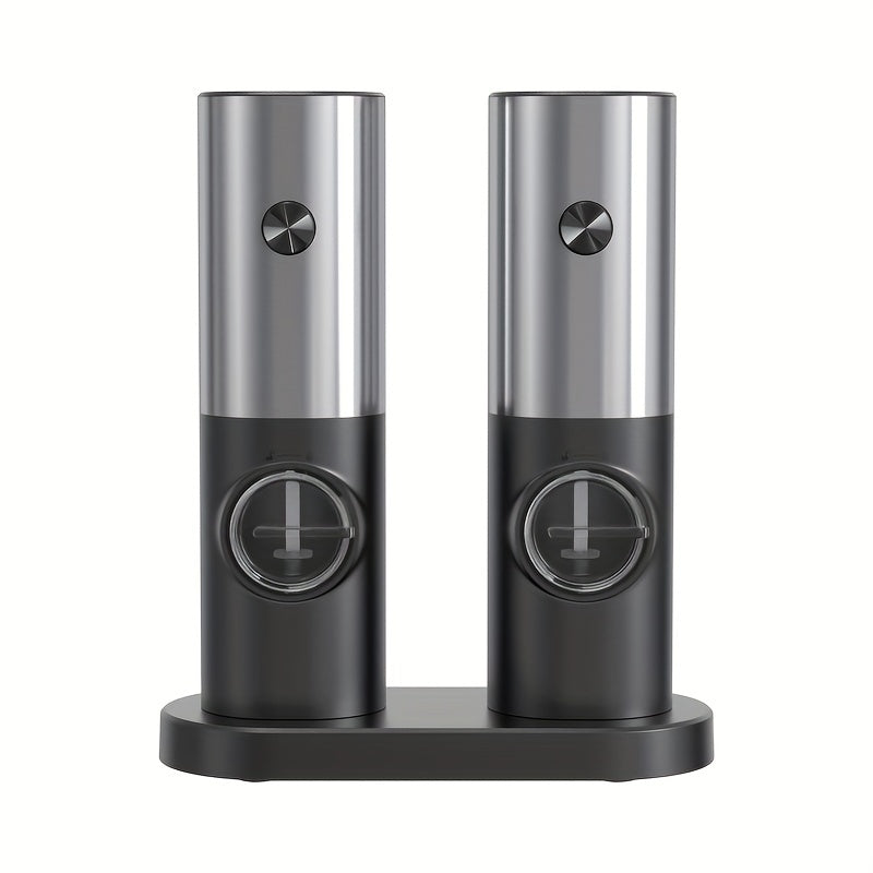 Set of 2 stainless steel electric salt and pepper mills with holder. These automatic mini smart grinders have adjustable coarseness and are battery operated (AAA). Requires 4 batteries (not included).