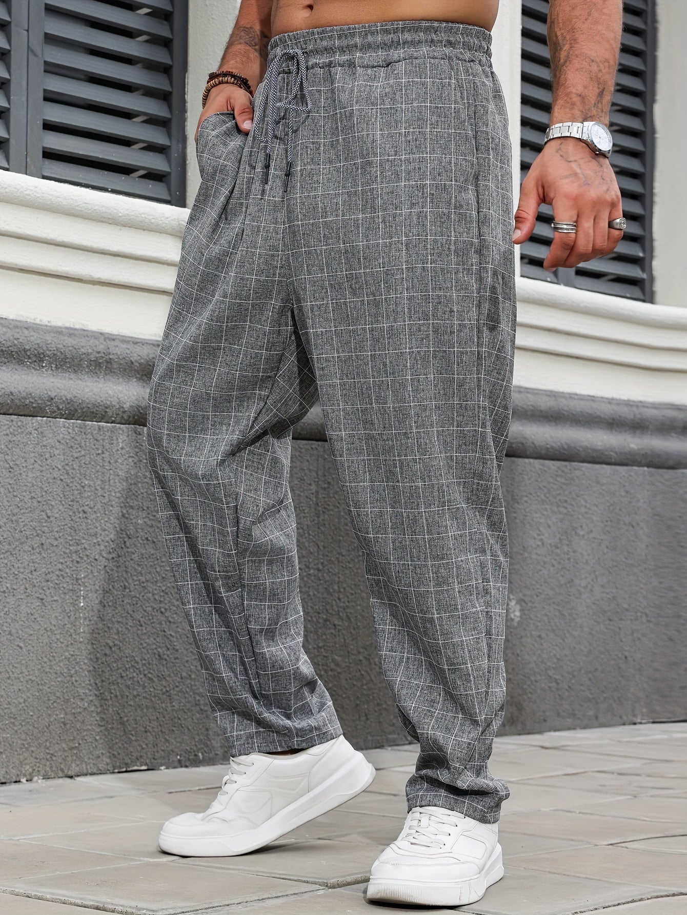 Oversized plaid pants for plus size men in breathable polyester for all seasons.