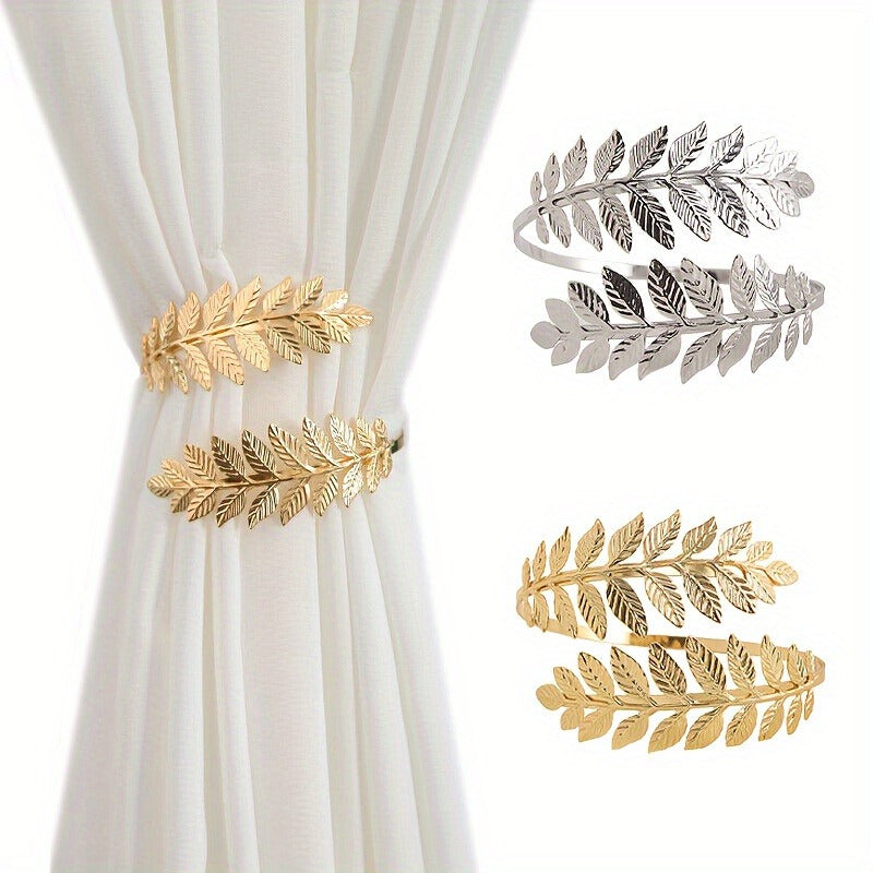 Add a touch of elegance to your living space with the Stunning Metal Leaf Curtain Clip Holder. This decorative curtain strap is perfect for adding a stylish finishing touch to your living room, bedroom, or office decor.