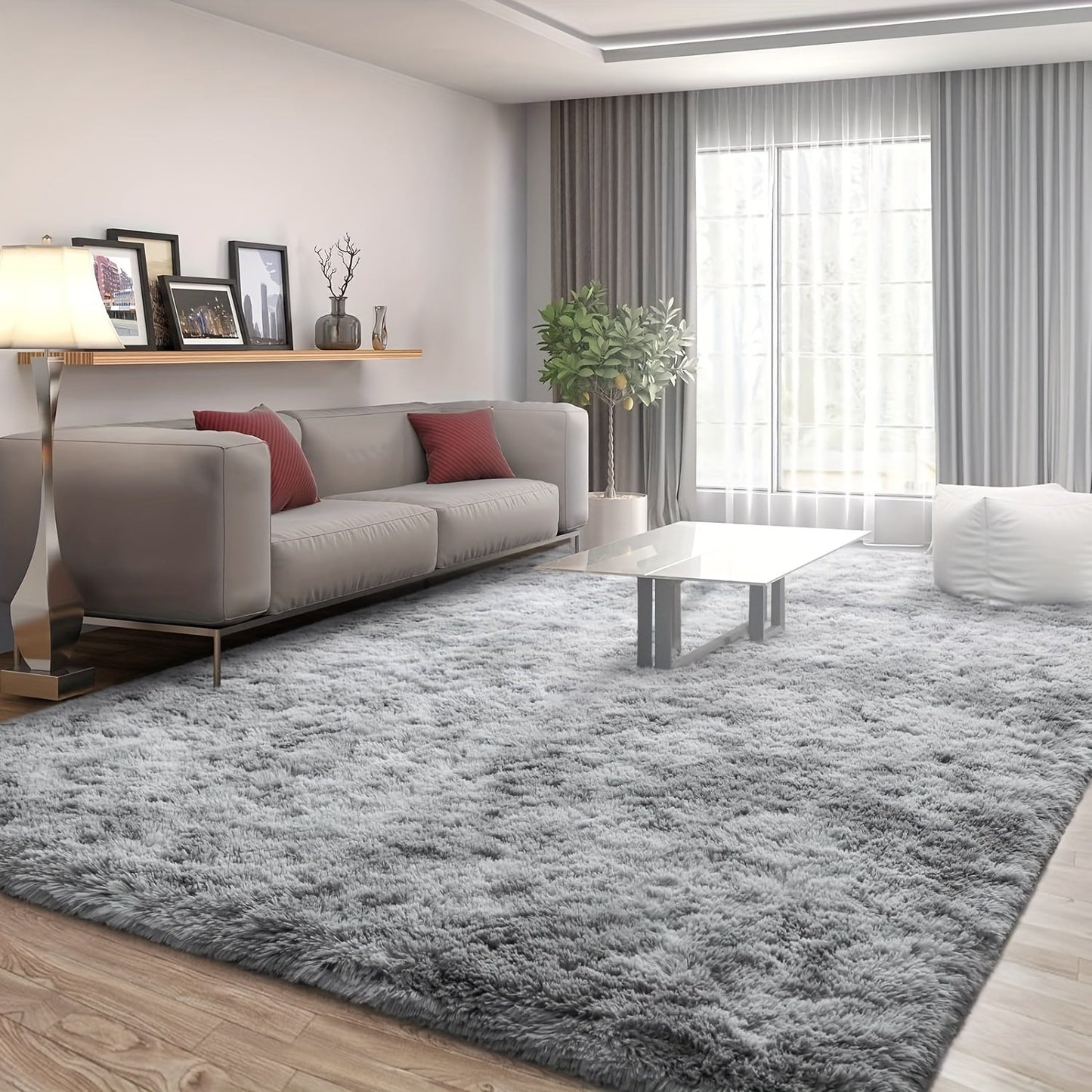 This soft and shaggy area rug is 200cm x 78.7in, 140cm / 55.1in, and is perfect for use in the living room, bedroom, or indoors. It is recommended to dry clean only and is made of polyester.