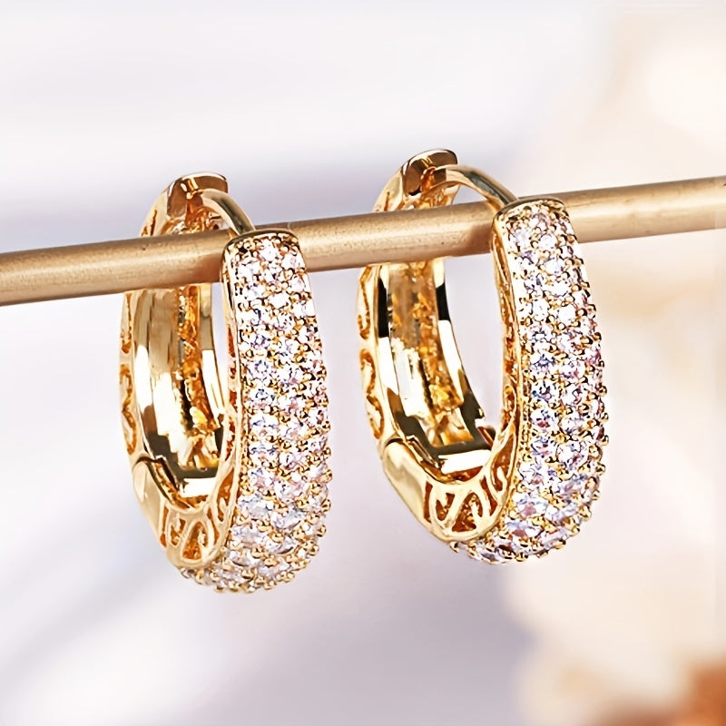 Vintage-style golden hoop earrings with sparking zirconia inlays, crafted from copper material, make a sophisticated and elegant gift for women.