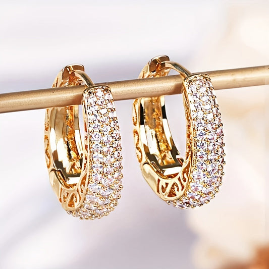 Vintage-style golden hoop earrings with sparking zirconia inlays, crafted from copper material, make a sophisticated and elegant gift for women.