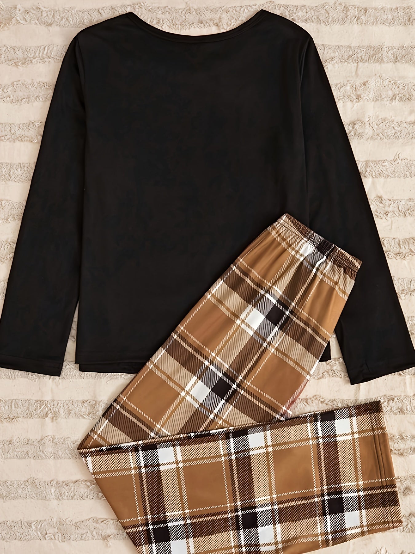 Women's cozy bear print lounge set with long-sleeve top and plaid pants for relaxed fall wear.