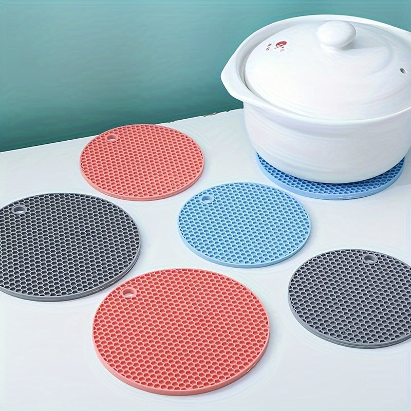 Round placemats with heat insulation, non-slip cup coasters, and pot pads for kitchen use.