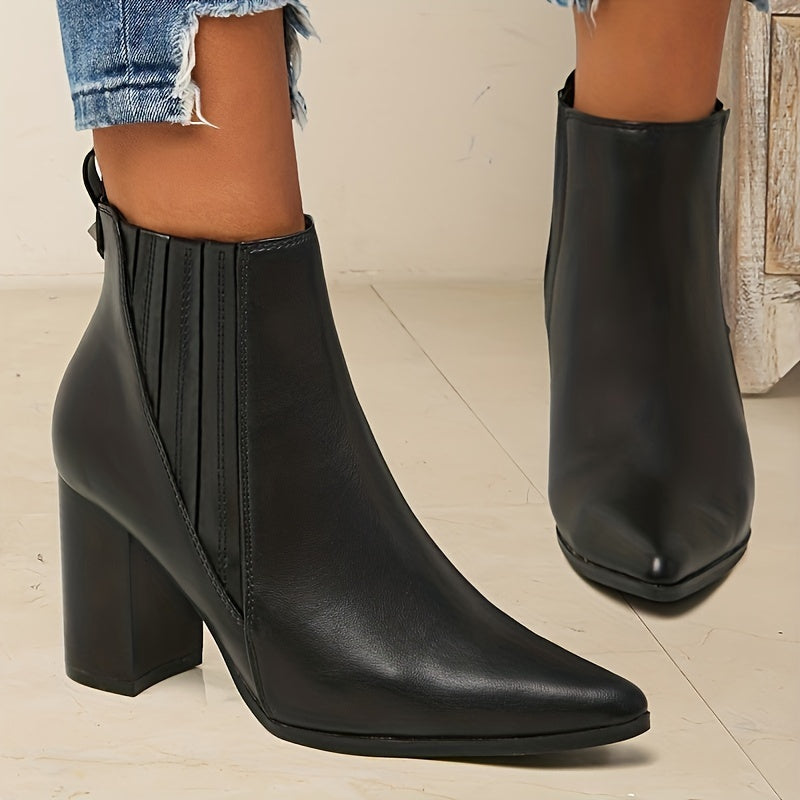 Trendy slip-on ankle boots in solid colors with chunky heels and a pointed toe.