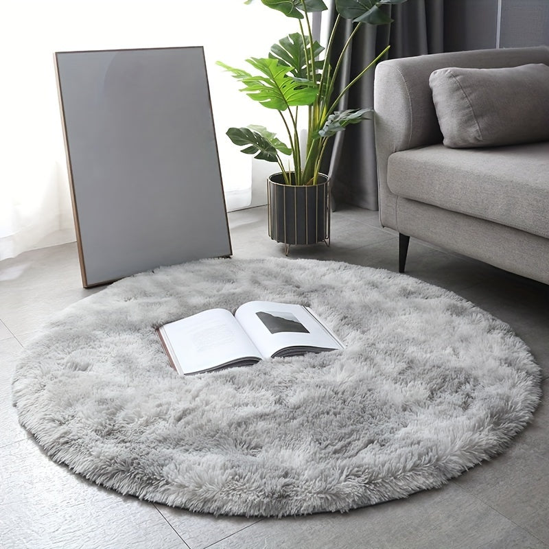 Get your hands on the luxurious 1pc Ultra-Soft Plush Round Mat, designed with a non-slip feature and machine washable for convenience. Available in Light Grey and Black Grey, this cozy floor mat is perfect for adding a touch of elegance to your bedroom