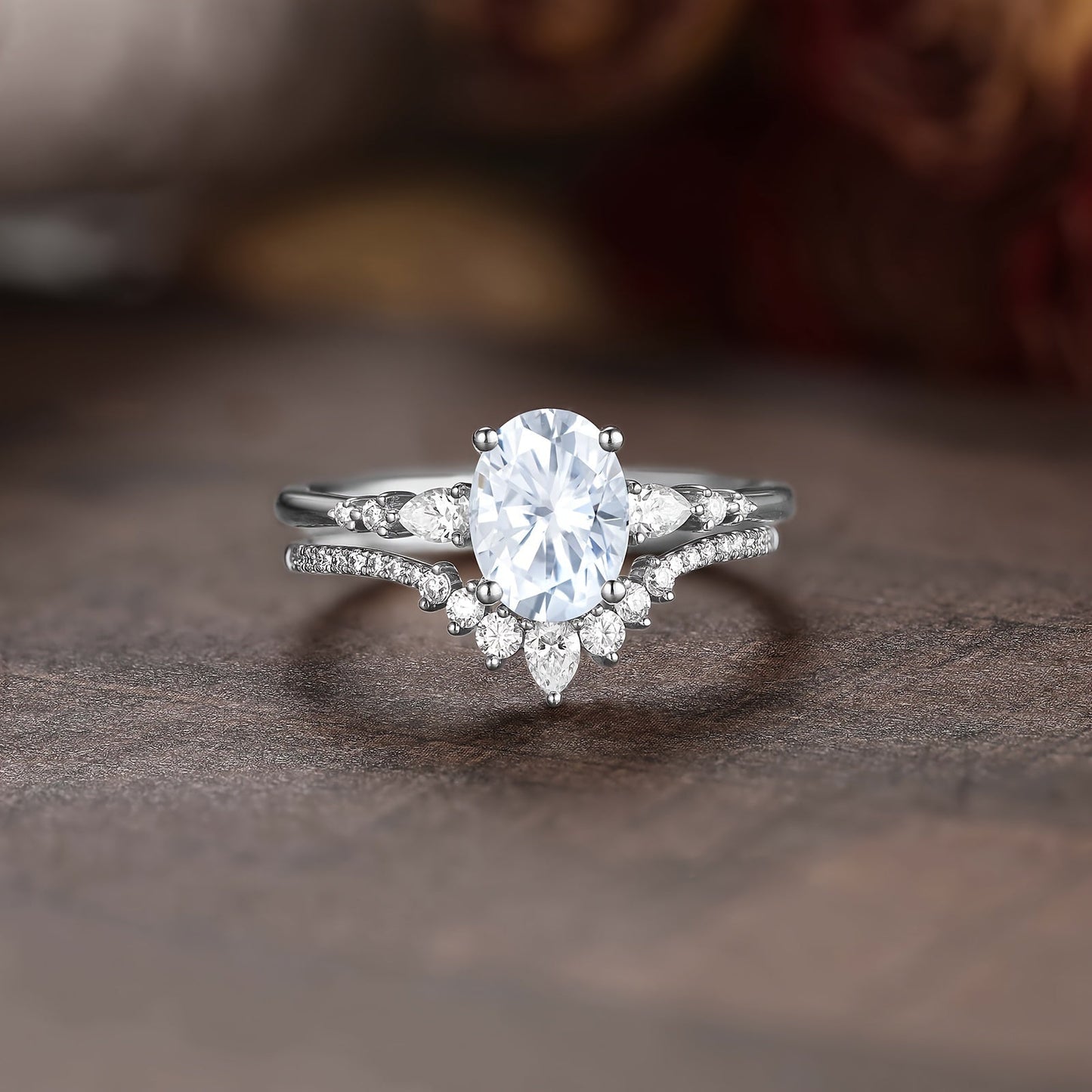 Two elegant and luxurious egg-shaped engagement rings for women, featuring an oval-shaped cubic zirconia center stone adorned with teardrop cubic zirconia. These exquisite and unique egg-shaped cubic zirconia women's wedding rings are perfect for