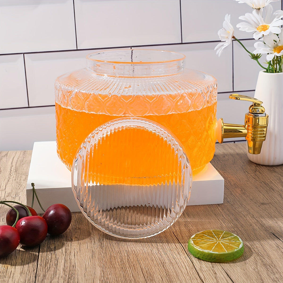 Large capacity glass beverage dispenser with spigot for serving cold drinks. This transparent thickened drink container is perfect for fruit juice, iced tea, and cocktails. Take it anywhere as a portable refrigerator drink dispenser.