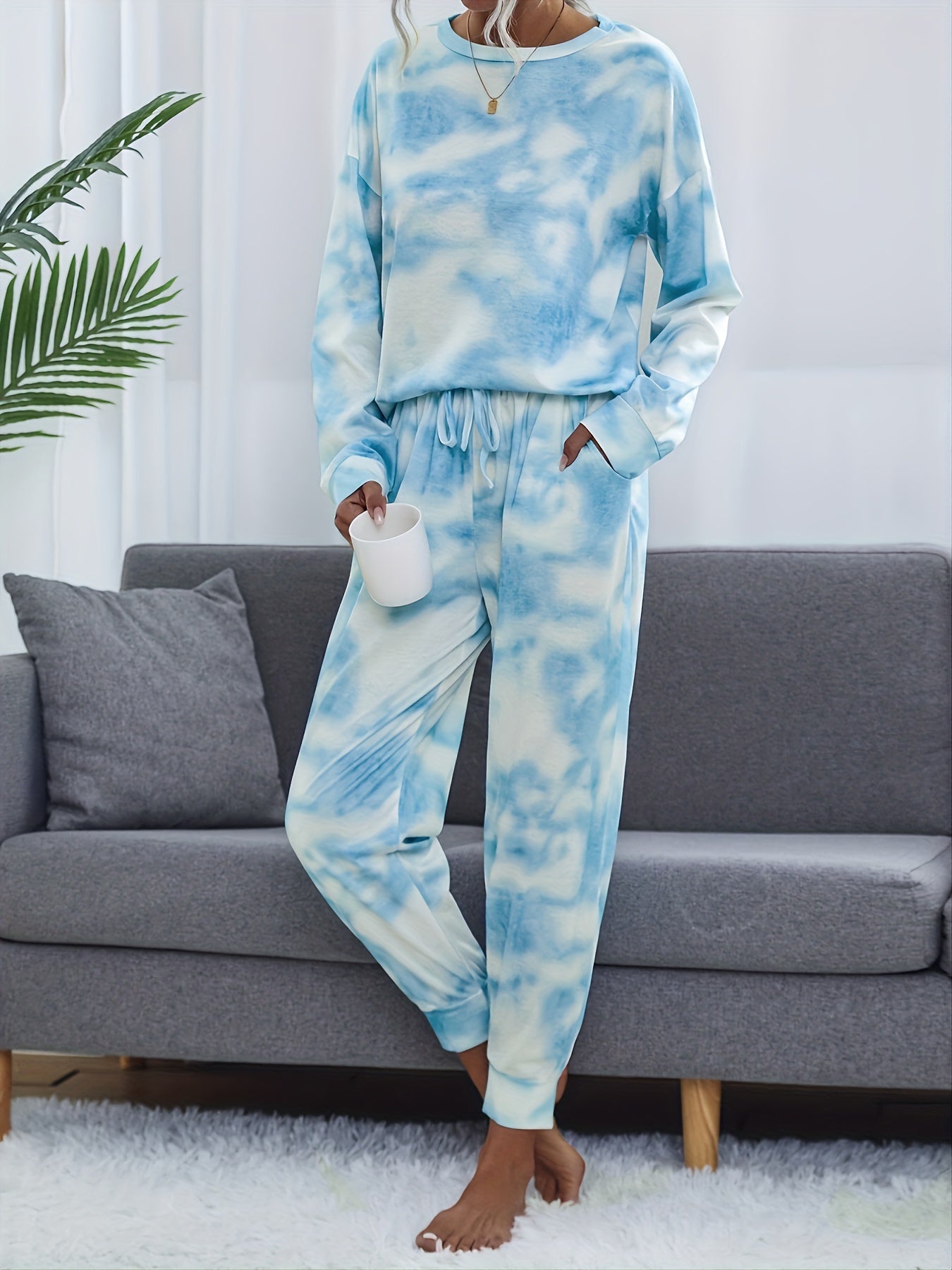 Tie dye lounge set for women, with long sleeve top and elastic waistband pants.