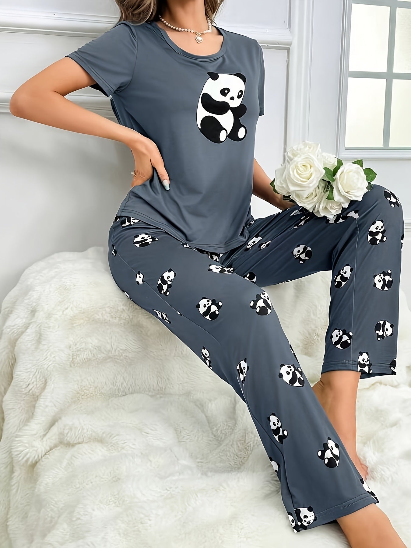 Women's cute panda print pajama set in dark gray, made of soft polyester and elastane blend. Features short sleeve crew neck top and long pants. Machine washable.