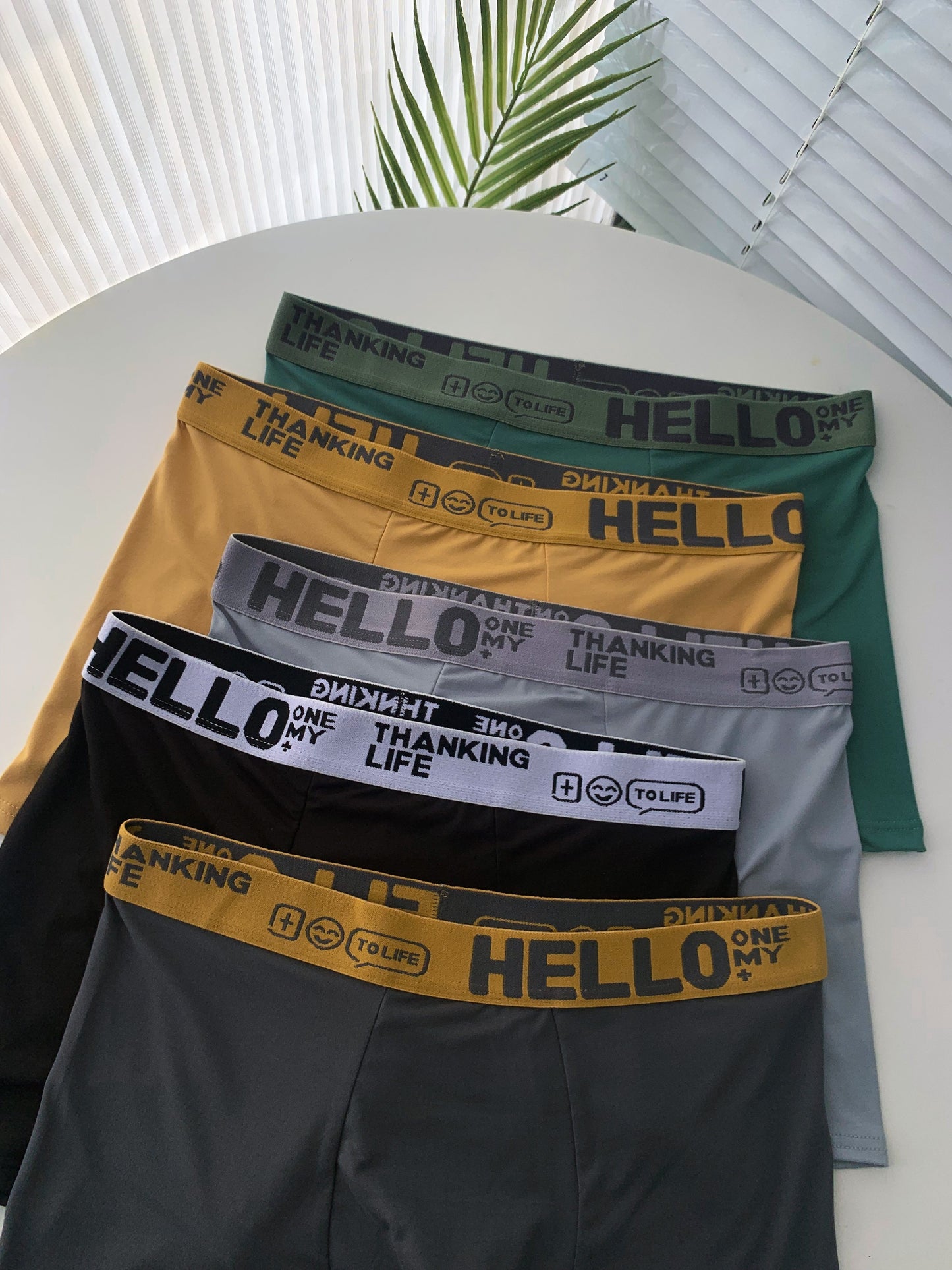 Randomly selected HELLO Men's underwear in 1, 3, or 5 pieces. Solid color square shorts, breathable and comfortable boxers.